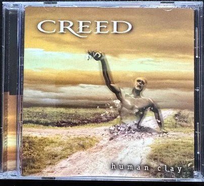 Creed – Human Clay (CD, Album, 1999, Wind-Up 60150-13053-2) - Maple City Music