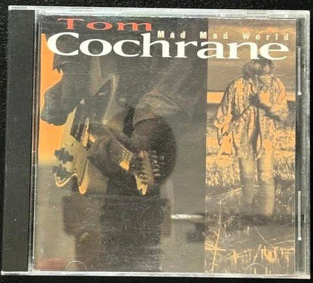 Tom Cochrane – Mad Mad World (Used) - Maple City Music
