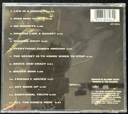Tom Cochrane – Mad Mad World (Used) - Maple City Music