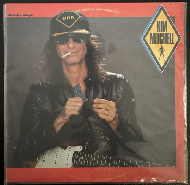 Kim Mitchell – Akimbo Alogo (LP, Album, Specialty Records Corporation Pressing, 1984, Bronze 90257-1)